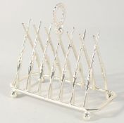 A SILVER PLATED CROSS RIFLES TOAST RACK.