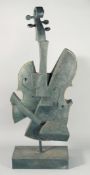 A LARGE ABSTRACT BRONZE CELLO. 35ins high.