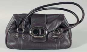 A CHRISTIAN DIOR VINTAGE LEATHER BAG with chrome 