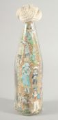 A DECOUPAGE BOTTLE. 10ins long.