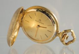 A LADIES 18K GOLD BUCHERER MINIATURE WATCH.