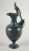 A GOOD 19TH CENTURY BRONZE GRAND TOUR EWER with two birds as handles. 9ins high.
