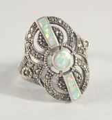 A SILVER AND OPAL RING.