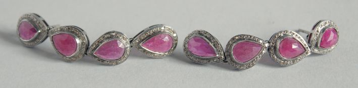 A PAIR OF RUBY AND DIAMOND DROP EARRINGS.