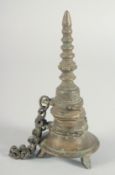 AN ISLAMIC BRASS TEMPLE FIGURE.