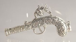 A SILVER PISTOL WHISTLE.