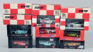 A TRAY OF 12 DIE CAST BOXED CARS.