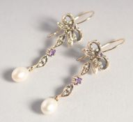 A PAIR OF 9CT GOLD TURQUOISE SET SEED PEARL EARRINGS.