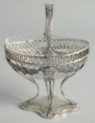 A CONTINENTAL SILVER MOUNTED GLASS SUGAR BASIN with garlands of grapes and figure heads.