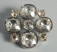 A CHANEL BROOCH, boxed.