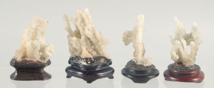 FOUR STALAGMITE SPECIMENS.