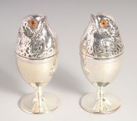 A PAIR OF SILVER PLATED CHICK EGG WARMERS.