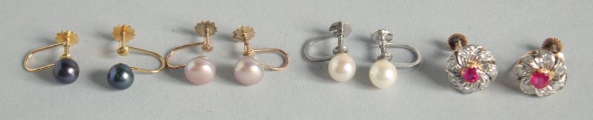 A PAIR OF RUBY AND DIAMOND CLUSTER EARRINGS AND THREE PAIRS OF PEARL EAR CLIPS (4 pairs).