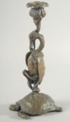 A BARBEDIENNE BRONZE STORK standing on a tortoise. 10ins high.