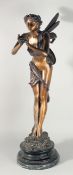 A LARGE TWO COLOURED BRONZE FAIRY holding pipes on a circular marble base. 37ins high.