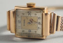 A LADIES 18K GOLD MAORI WRISTWATCH.