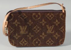 A LOUIS VUITTON BEAD EVENING BAG. 8ins long, 5ins deep.
