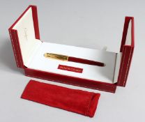 A VERY GOOD CARTIER PASHA PEN AND REFILLS in original box.
