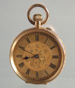 A LADIES ENGRAVED GOLD FOB WATCH.