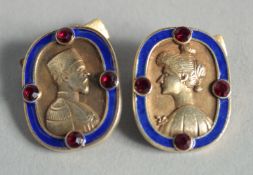 A PAIR OF RUSSIAN SILVER AND BLUE ENAMEL CUFF LINKS.