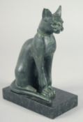 A RARE CARVED STONE EGYPTIAN SEATED CAT. 6ins high on a marble base.