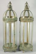 A PAIR OF CIRCULAR COPPER AND GLASS LANTERNS. 35ins high.