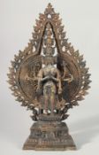 A BURMESE MULTI HEAD DEITY 14ins high.