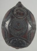 A VERY FINE CARVED COCONUT WINE TASTING CUP.