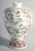 A CHINESE UNDERGLAZE RED PORCELAIN MEIPING VASE decorated with a warrior. 12ins high.