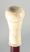 A CARVED BONE HANDLE WALKING STICK 