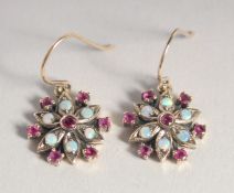 A PAIR OF 9CT GOLD OPAL AND RUBY EARRINGS.