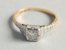 AN 18CT WHITE GOLD AND PLATINUM SOLITAIRE DIAMOND RING