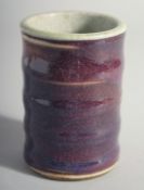 A CHINESE RIBBED SPECKLED BLUE PORCELAIN BRUSH POT. 4.5ins high.