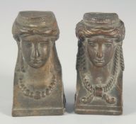 A SMALL PAIR OF BRONZE EGYPTIAN BUSTS. 3.5ins.