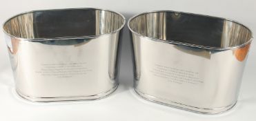 A PAIR OF LILY BOLLINGER WINE COOLERS. 17ins long.
