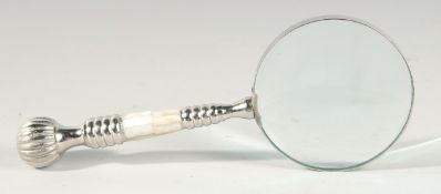 A MAGNIFYING GLASS with mother of pearl and chrome handle.