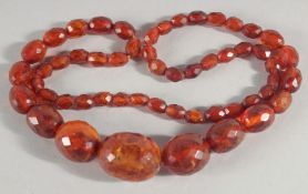 A FACETED AMBER NECKLACE
