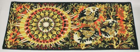 J. C. BISSERY A DECORATIVE WOOL WORK HANGING depicting stylised sun, birds, and trees. 6ft 7ins long