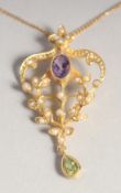 A SILVER GOLD PLATED SUFFRAGETTE AMETHYST, PERIDOT AND RUBY PENDANT AND CHAIN.