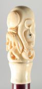 A CARVED BONE HANDLE WALKING STICK 