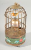 A SMALL CLOISONNE BIRD CAGE CLOCK 5.5ins high.