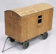 A GOOD OAK LARGE SCALE HANDMADE MODEL OF A SHEPHERDS HUT with removable domed top, door to one