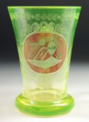 A GOOD CONTINENTAL URANIUM BEAKER with handle. 4.5ins high.