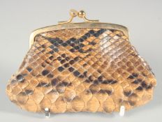 A SMALL SNAKESKIN PURSE. 4ins long.