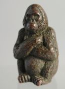 A JAPANESE BRONZE GORILLA 2ins high.