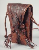 A RARE ALLIGATOR SKIN HANDBAG with two handles, the flap with a small head, with fitted interior and