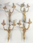 A SET OF FOUR BRANCH WALL SCONCES.