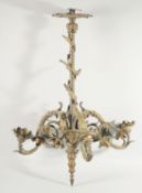 A VERY GOOD 19TH CENTURY FRENCH ORMOLU CHERUB CANDLESTICK with six scrolling branches.