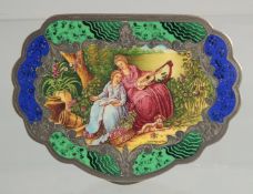 A SILVER AND ENAMEL COMPACT with a mirror inside. 3.5ins.
