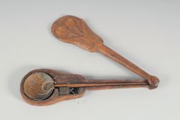 A SET OF BRASS BALANCE SCALES in a wooden spoon shaped case. 13ins long.